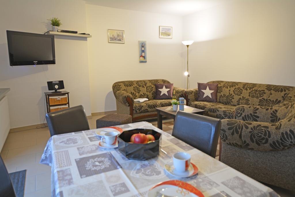 Appartment Vermietung Luetje Бюзум Номер фото